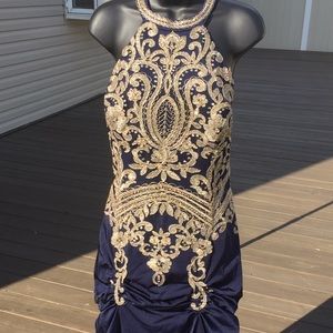 Beautiful gown with small train by Let’s, blue and gold